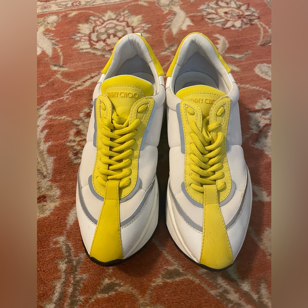 Jimmy Choo tennis shoes. Light wear and tear.